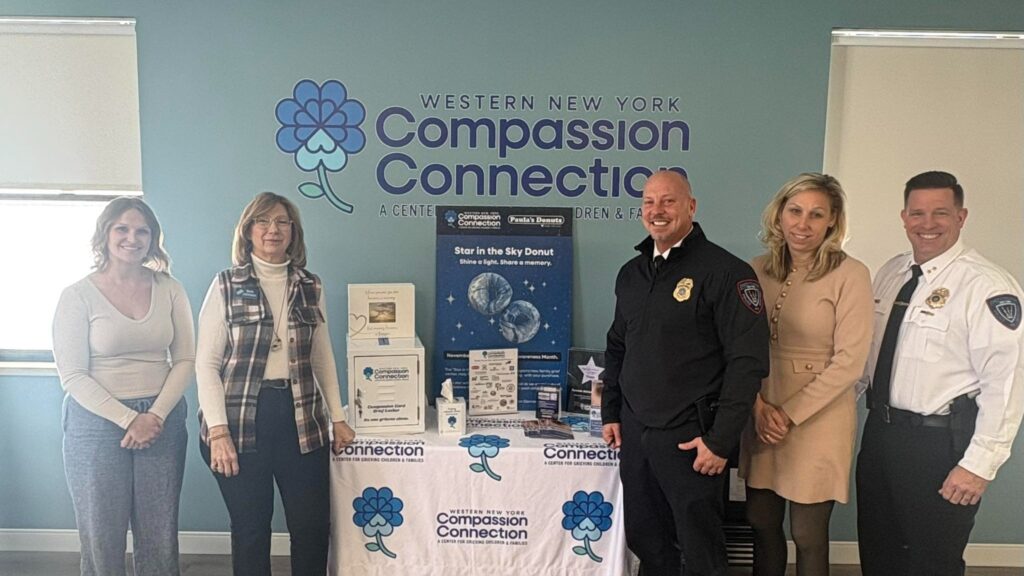 First responders and grief counselors gathering near a memorial site in Shreveport, Louisiana.