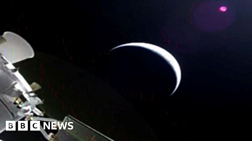 Artemis II mission crew embarks on historic journey beyond Earth's orbit towards the Moon.