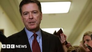 Former FBI Director James Comey facing new charges related to an Instagram post with '86 47' seashells.
