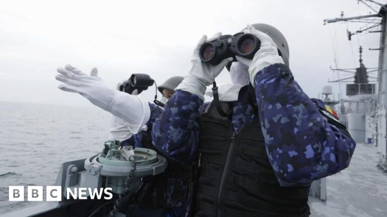 Former U.S. President Donald Trump gestures while speaking, highlighting his controversial stance on the NATO alliance.