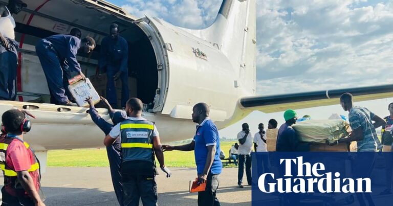 Ground crew unloading aid cargo from EnComm Aviation aircraft, central to the BAE Aviation Lawsuit.