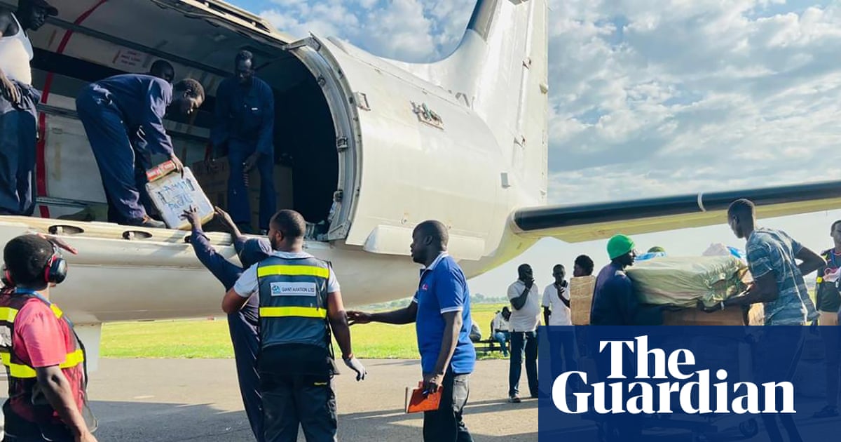 Ground crew unloading aid cargo from EnComm Aviation aircraft, central to the BAE Aviation Lawsuit.
