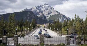 A family enjoying a scenic Canadian landscape, symbolizing resilient travel plans.