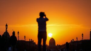 A general view of a hot, sunny day in Delhi with heat haze. The image represents the severe heatwave conditions in the capital city.