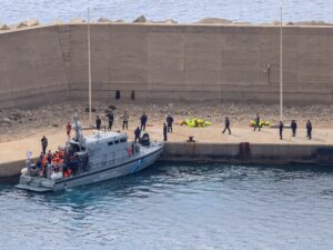 Image showing a Greek coastguard vessel transferring activists from the Global Sumud Flotilla at the port of Atherinolakkos, Crete, after an Israeli interception.