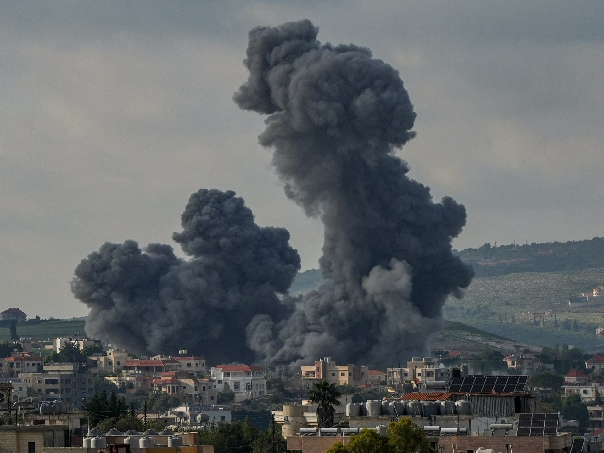 Image showing smoke rising in Habboush following Israeli strikes, seen from Nabatieh, Lebanon.