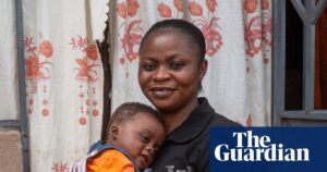 Naomi holding her baby, Wonder, who was among the first infants to receive the new malaria treatment Coartem Baby.