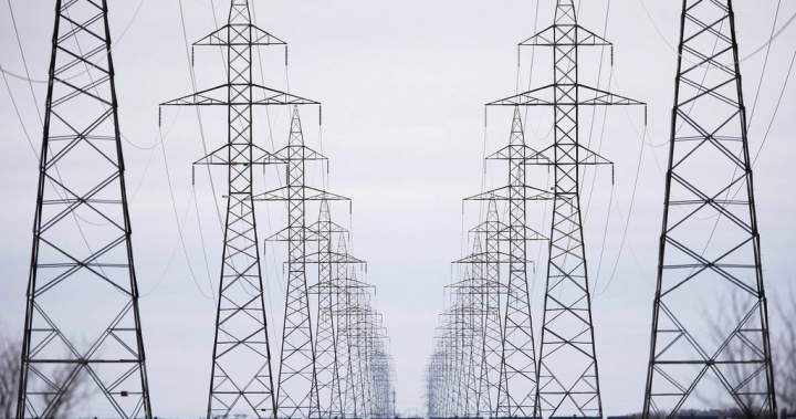 Image of Manitoba Hydro power lines against a stormy sky, indicating widespread power outages due to severe weather.