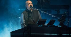 Peter Gabriel on stage, advocating for Vancouver lifeguards.
