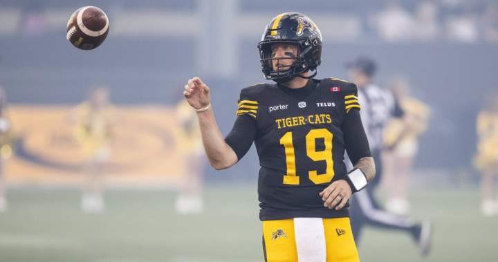 Bo Levi Mitchell warms up before the Hamilton Tiger-Cats vs. B.C. Lions CFL game