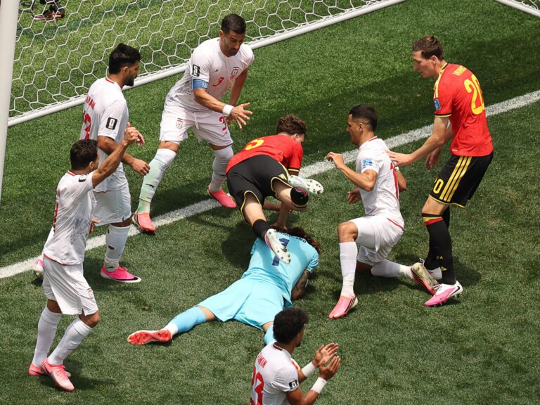 Image from the Belgium vs Iran World Cup Group G match, potentially showing a key save or a red card incident.