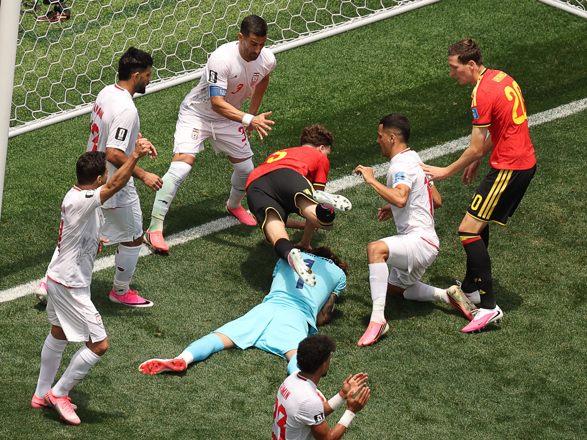 Image from the Belgium vs Iran World Cup Group G match, potentially showing a key save or a red card incident.