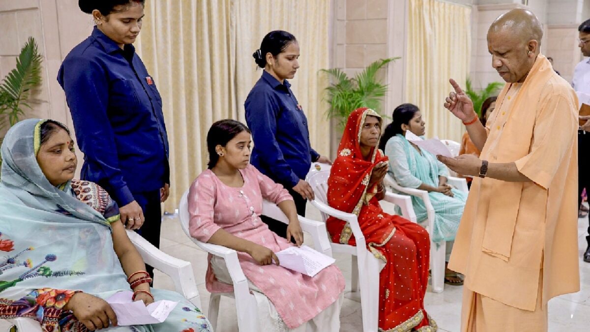 CM Yogi Adityanath interacts with citizens during a Janata Darshan program in Gorakhpur.