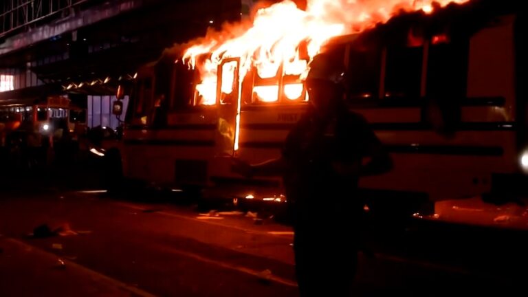 Footage shows a World Cup shuttle bus set into flames amid chaotic New York Knicks NBA Finals victory celebrations.