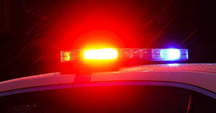 Police lights flashing at a crime scene in Toronto where a fatal incident occurred.