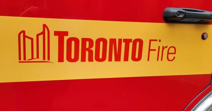 A Toronto fire truck shown on a city street, representing emergency services in action.