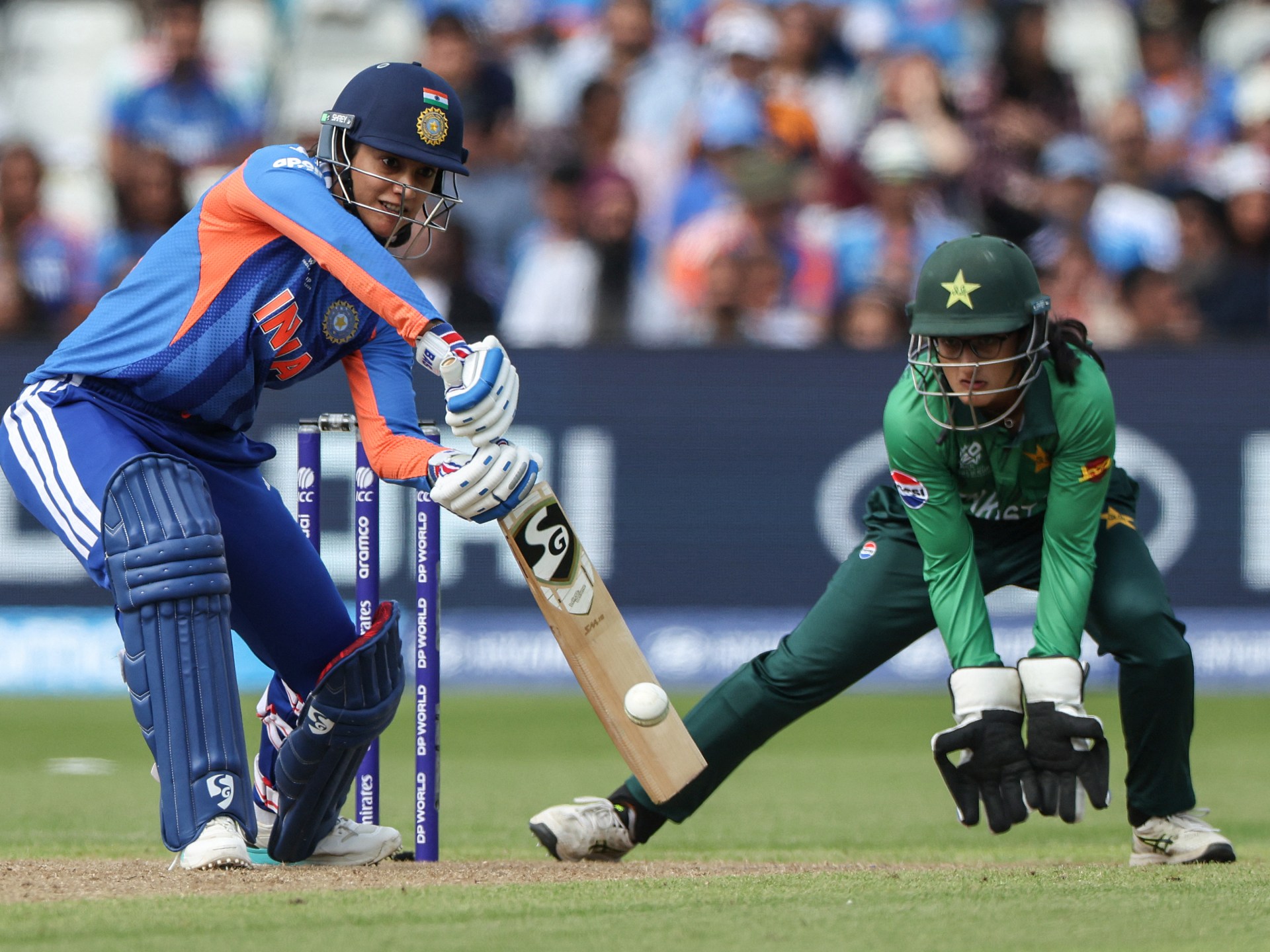 India beats Pakistan in Women's T20 World Cup opener with Mandhana's 68 and Sharma's 5 wickets.