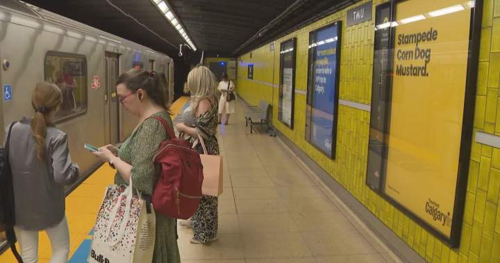 Toronto subway station transformed by Calgary tourism campaign featuring vibrant colours and local references.