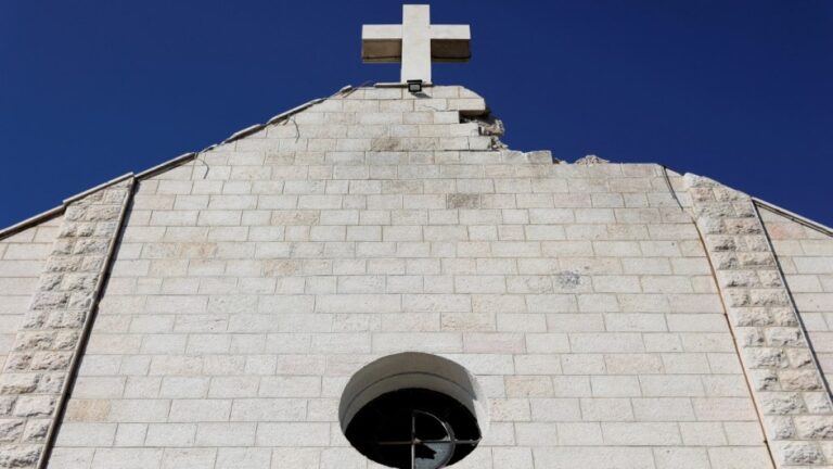 A damaged church in Gaza City amidst conflict, symbolizing the plight of Palestinian Christians.