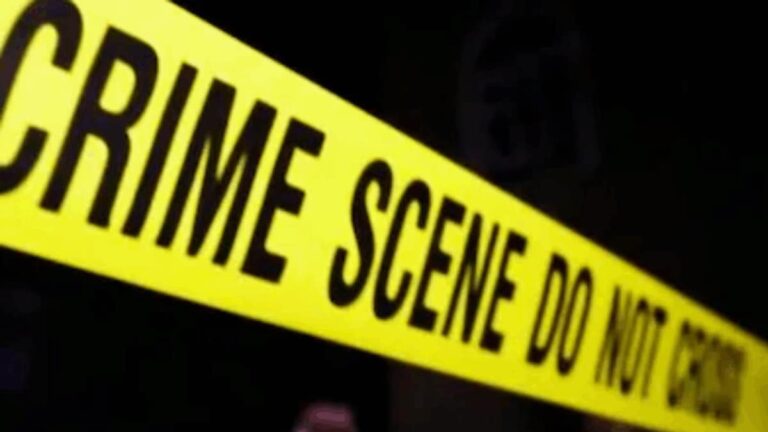 An image depicting a crime scene or police investigation outside a bank building.