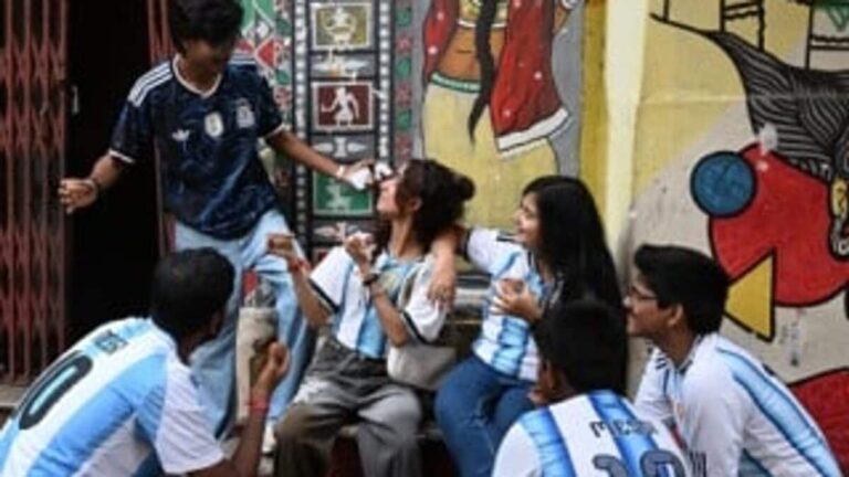 Fans in Kolkata watching the FIFA World Cup on a roadside tea shop in 2026, showing the massive engagement of the India football market.