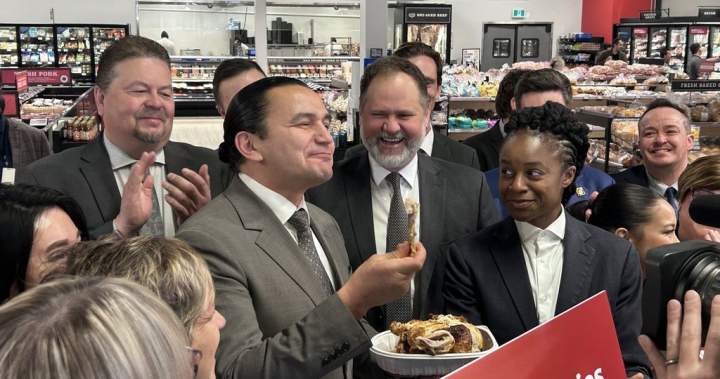 Manitoba Premier Wab Kinew in a grocery store promoting the provincial sales tax cut on food.