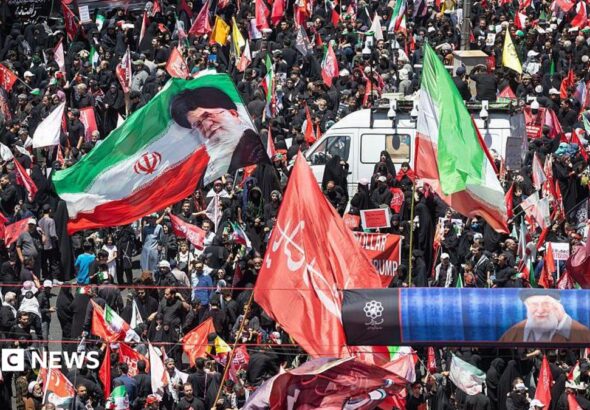 Vast crowds of mourners dressed in black gathered on a boulevard in Mashhad for the Supreme Leader's burial procession.
