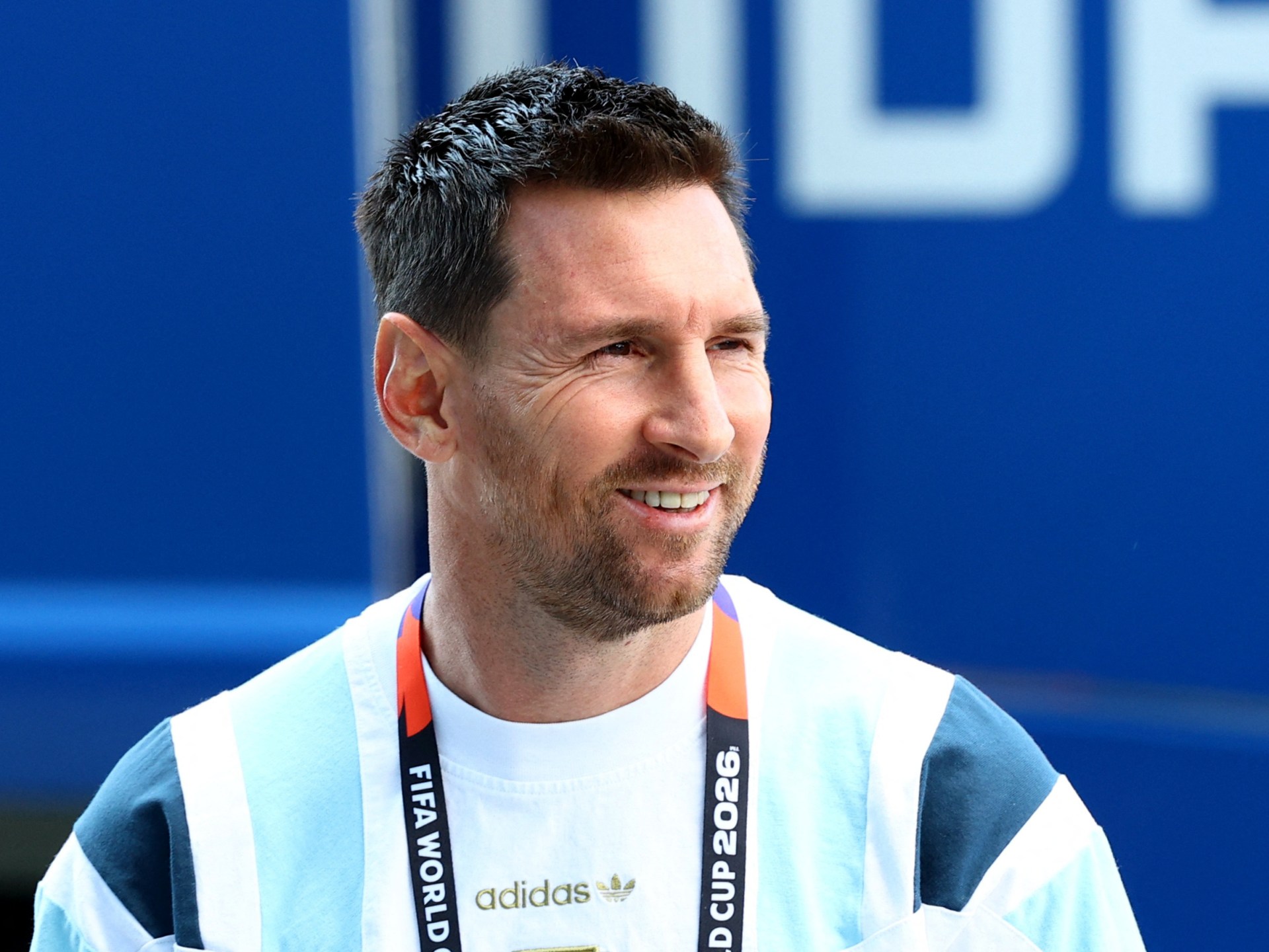 Lionel Messi smiles in his Inter Miami kit after returning to training.