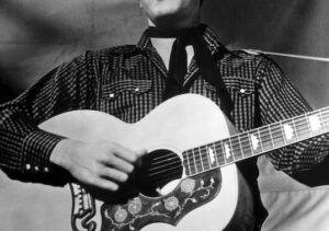 An old image of Elvis Presley, a visual representation of music conspiracy theories.