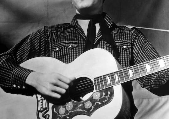 An old image of Elvis Presley, a visual representation of music conspiracy theories.