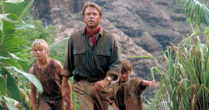 Image of Sam Neill as Dr. Alan Grant in Jurassic Park with children Lex and Tim.