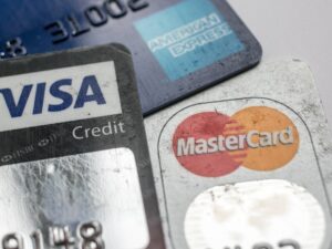 Credit and debit cards shown, illustrating financial transactions and potential fraud.