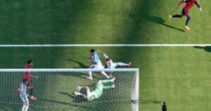 Ferran Torres celebrates scoring the winning goal for Spain in the World Cup final.