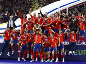 A news article discussing the moral implications of Spain's World Cup victory amidst global events.