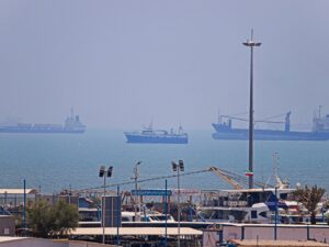 Vessels anchored in Bandar Abbas, Iran, along the Strait of Hormuz during a period of geopolitical tension and naval blockade.