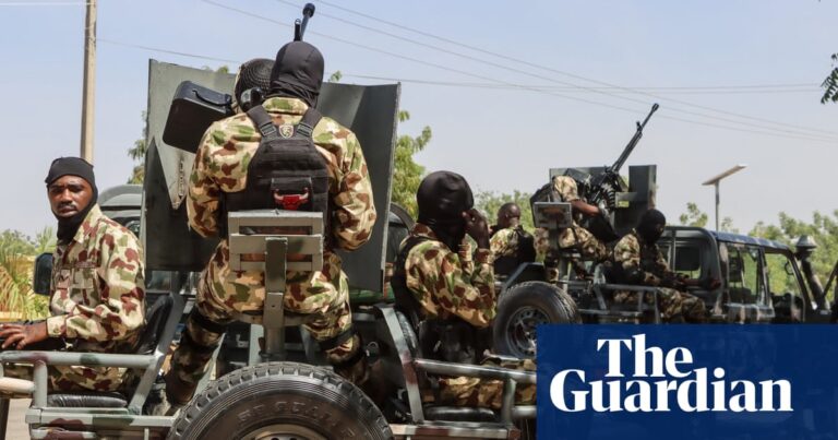 Nigerian soldiers patrol a road in Borno state, a region affected by banditry and insurgency.