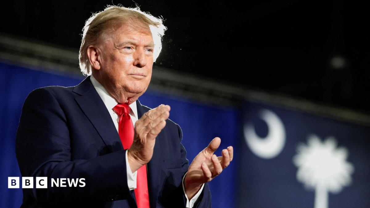 US President Donald Trump speaks on stage, emphasizing his stance on Canada-US trade.