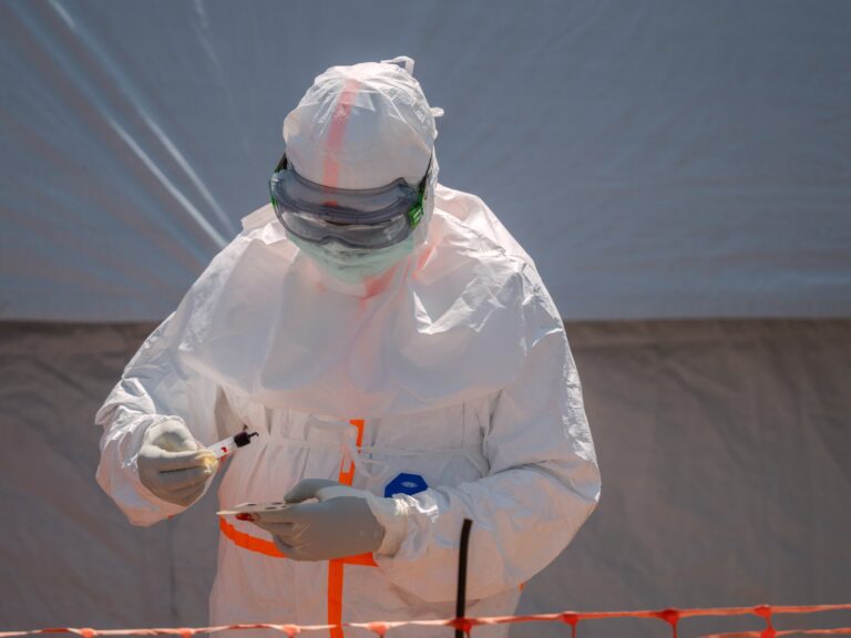 Health worker preparing a blood sample for Ebola testing at Bunia General Hospital in Bunia, DRC.