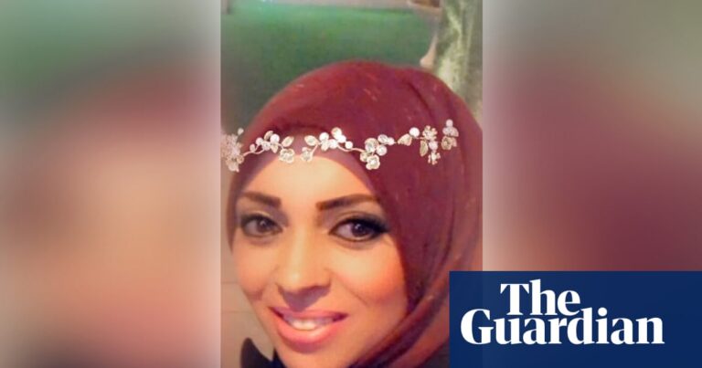 Close-up of Eman el-Shazly, a British-Egyptian woman arrested in Cairo, wearing a maroon headscarf and smiling.