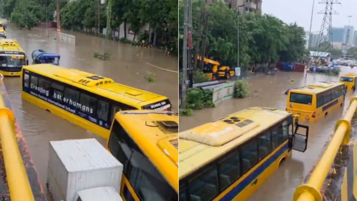 Image of severe waterlogging in Gurugram, with vehicles stuck in deep water after heavy rain.