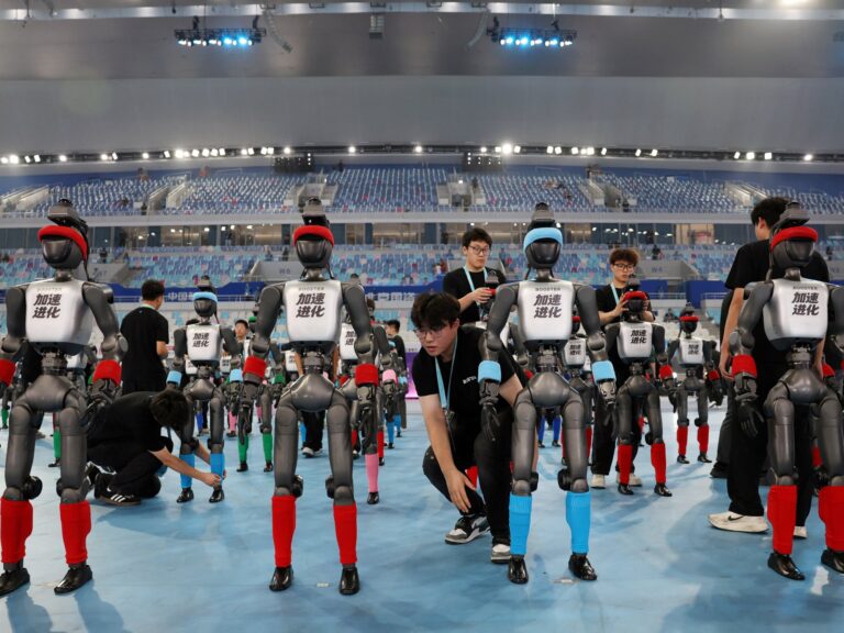 A humanoid robot crossing the finish line, shattering speed records.