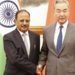 NSA Ajit Doval and Chinese Foreign Minister Wang Yi engaging in diplomatic discussions.