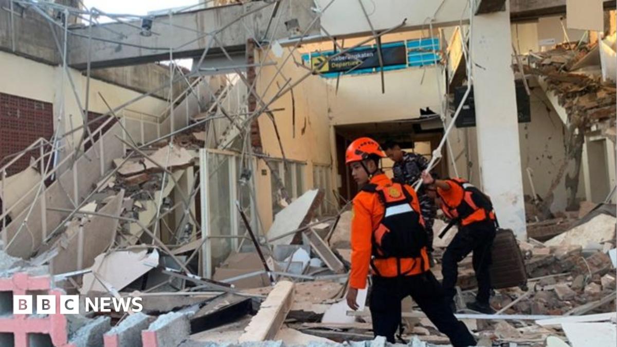 An article detailing the impact of the 7.7 magnitude earthquake in Indonesia, specifically Flores, including casualties and damage.