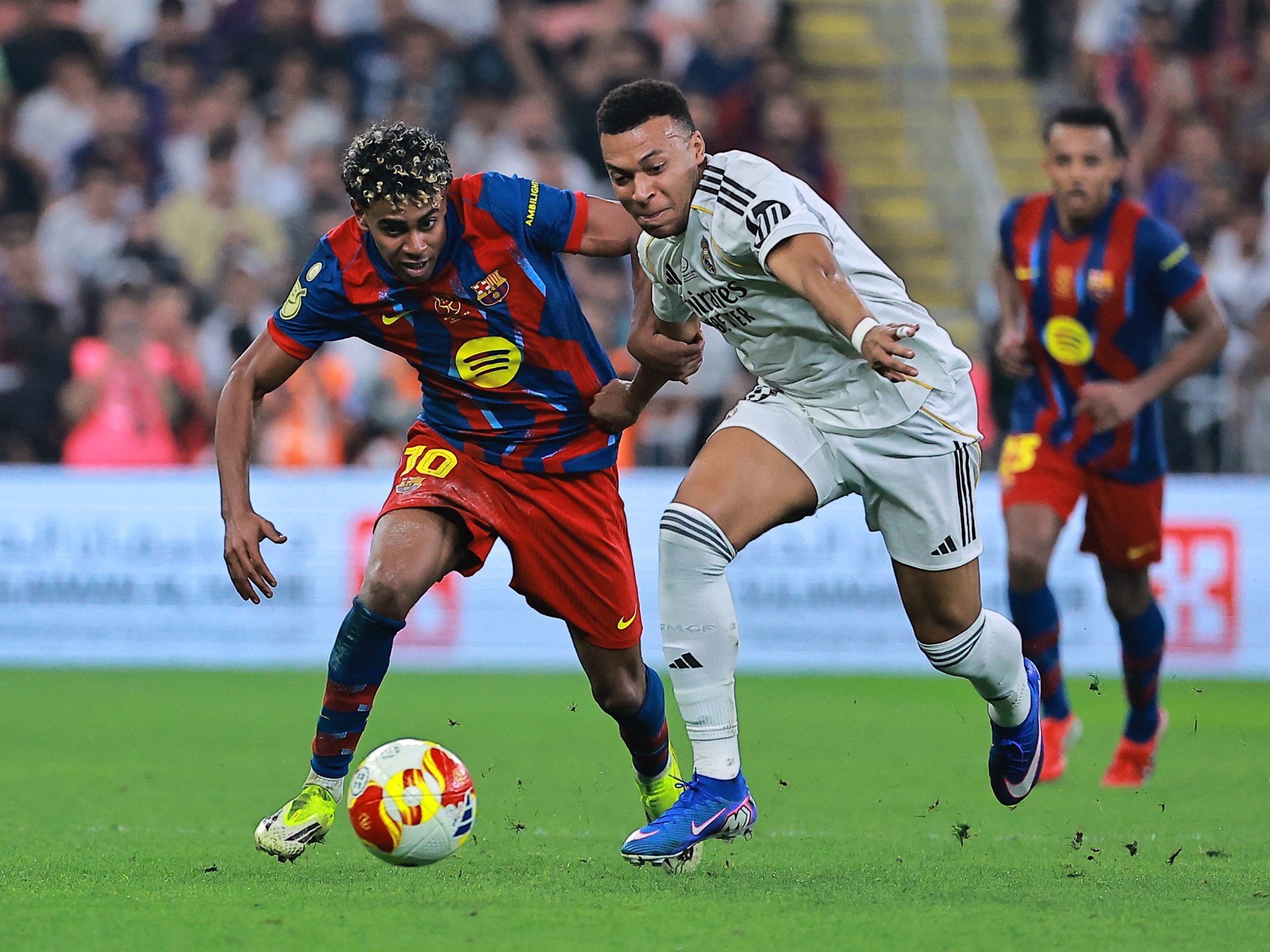 Top football stars like Kylian Mbappe, Lamine Yamal, Harry Kane, and Bruno Fernandes in action on the pitch.