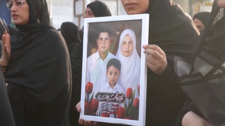 Funeral in Iran for a family killed in a US strike on Qeshm Island, highlighting the tragic human cost and escalating tensions.
