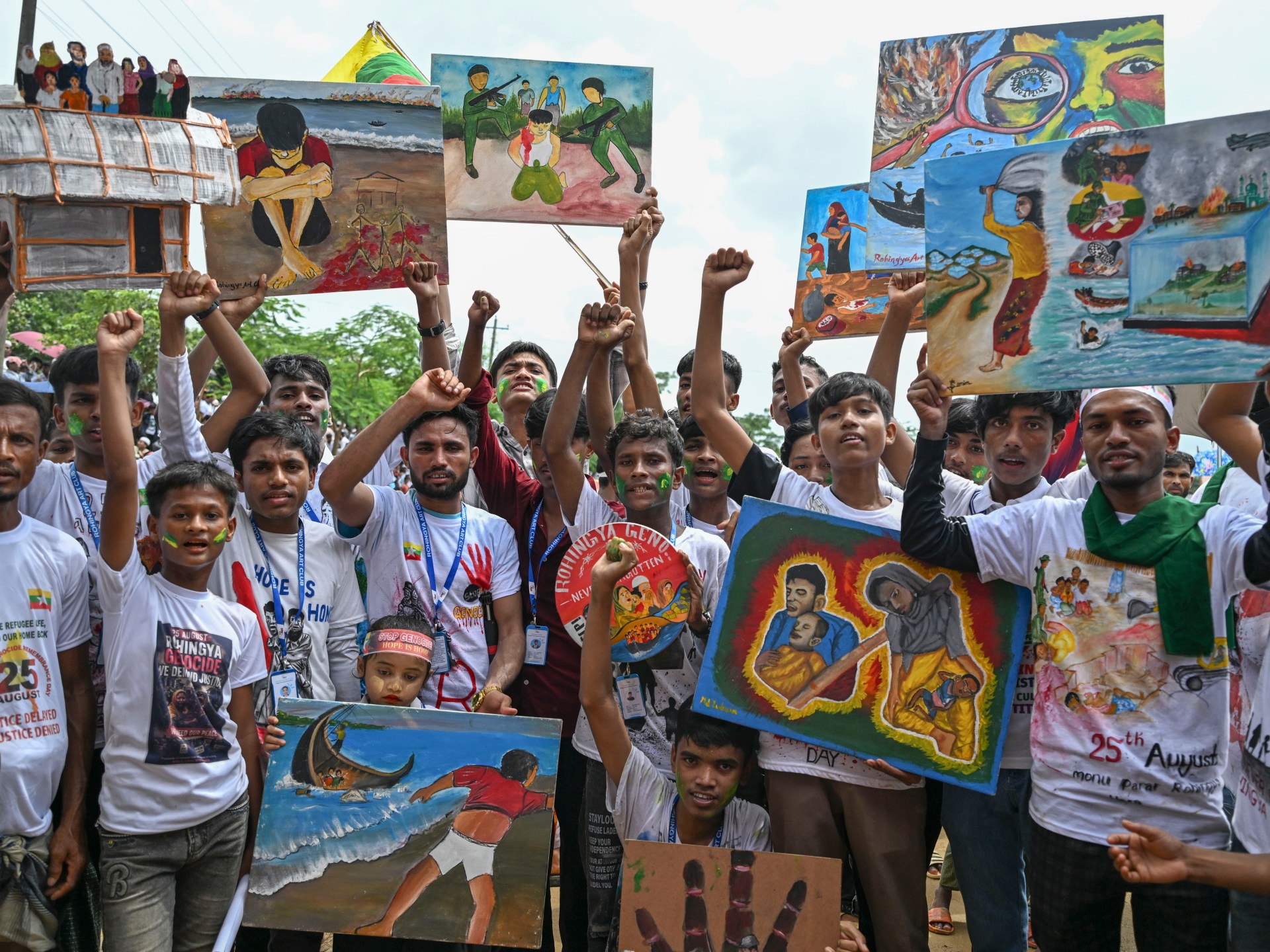 Rohingya refugees rally in Cox's Bazar, Bangladesh, marking nine years since their mass exodus from Myanmar.