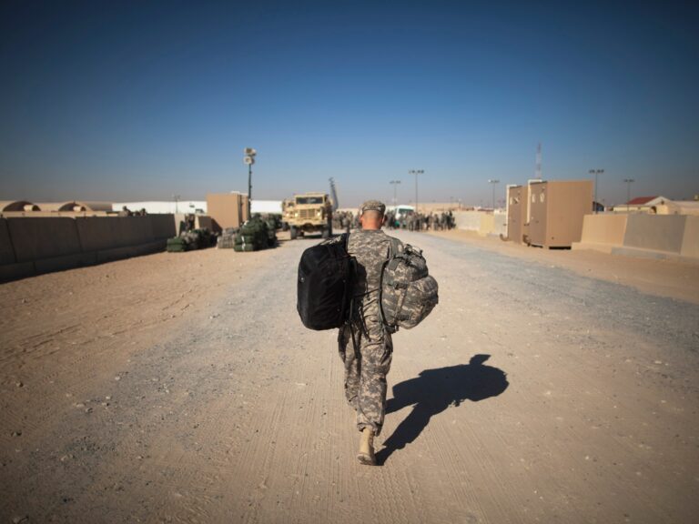 US soldier in Kuwait. Represents US military presence in the Middle East amidst changing regional alliances.