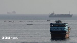 News article on Iran's agreement with Oman regarding shipping routes through the Strait of Hormuz amidst US tensions.