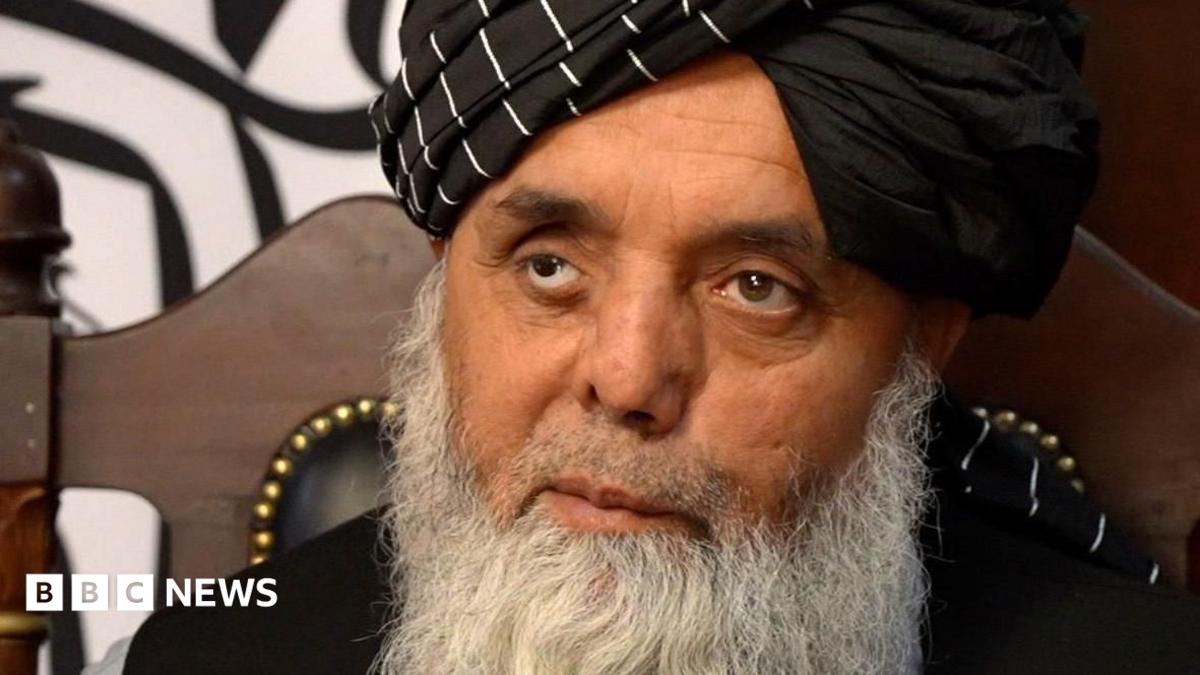 Image of Governor Abdullah Sarhadi, a key figure in the Taliban administration, reflecting on the governance of Afghanistan.