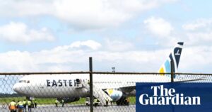 A passenger plane on the tarmac at Roberts International Airport in Monrovia, Liberia, after arriving with deportees from the United States.